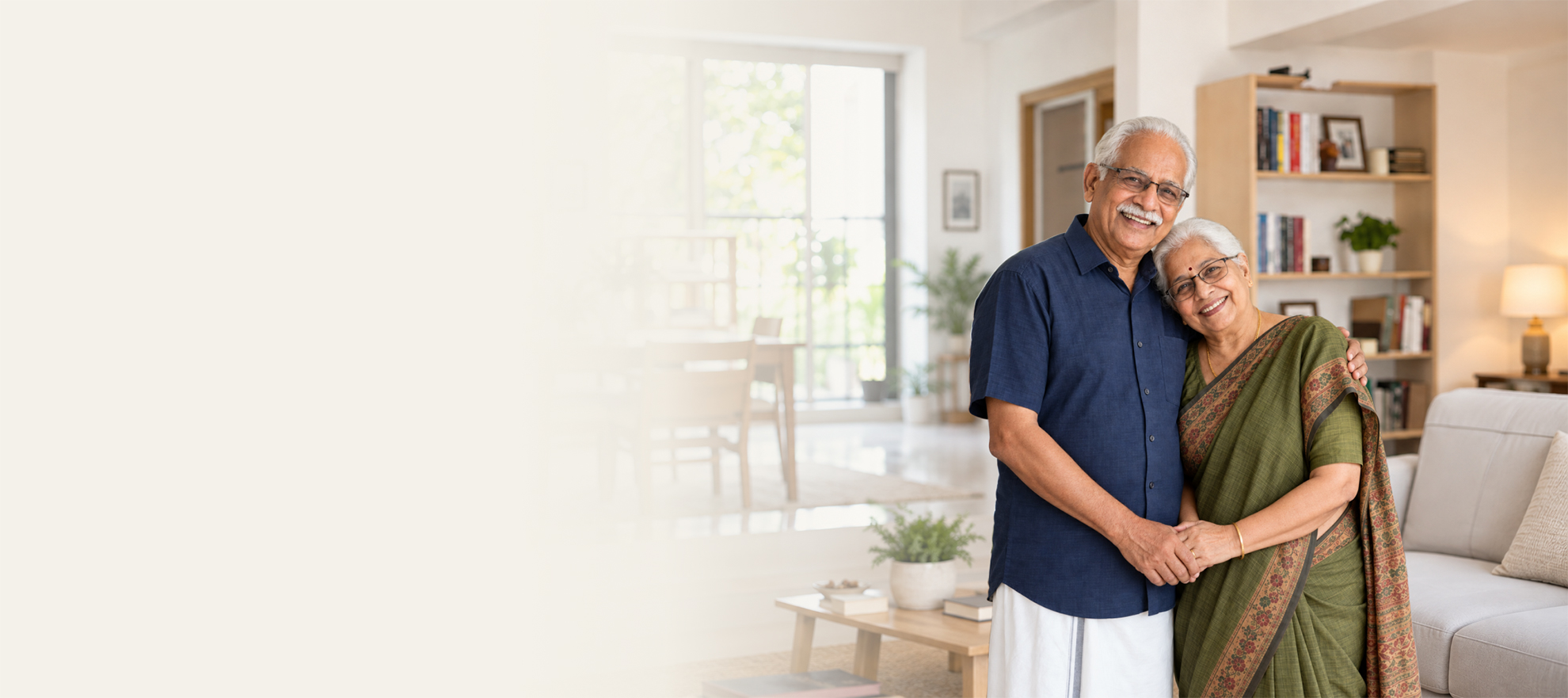 Smiling elderly Indian couple walking arm-in-arm outdoors, representing healthy ageing